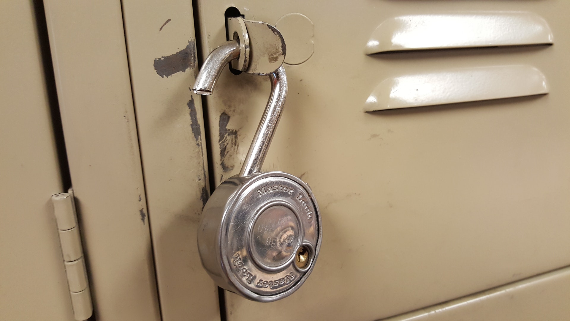 A padlock that has been cut apart.